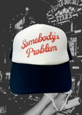 Load image into Gallery viewer, Somebody's Problem Trucker Hat