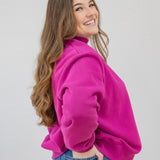 model in berry mock neck l/xl