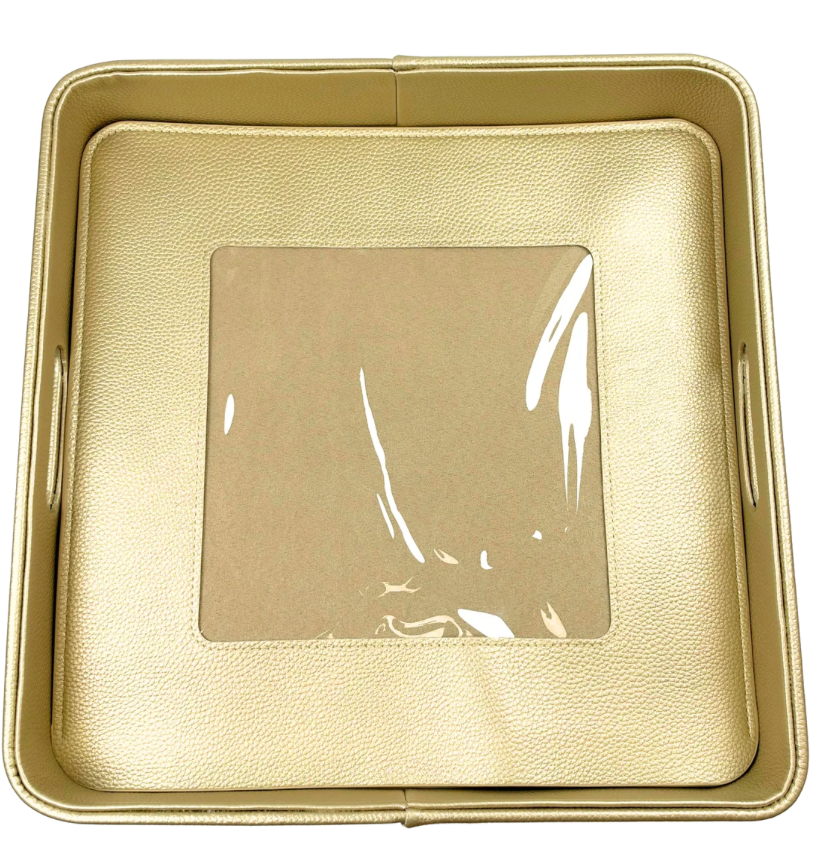 Gold metallic self-finishing needlepoint valet tray with a square customizable needlepoint window, raised sides, and textured finish.