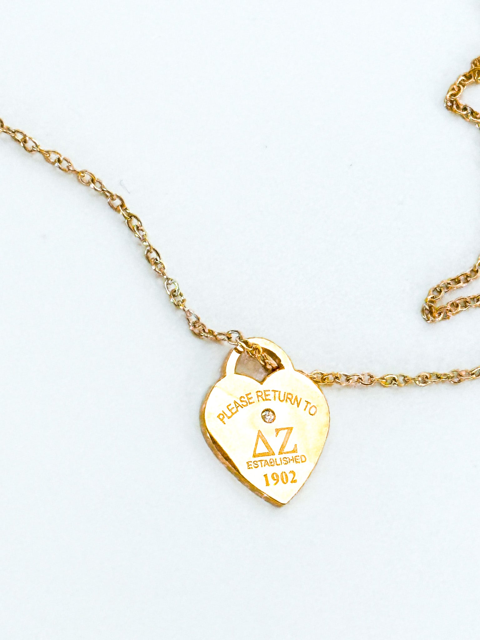 Please Return Necklace