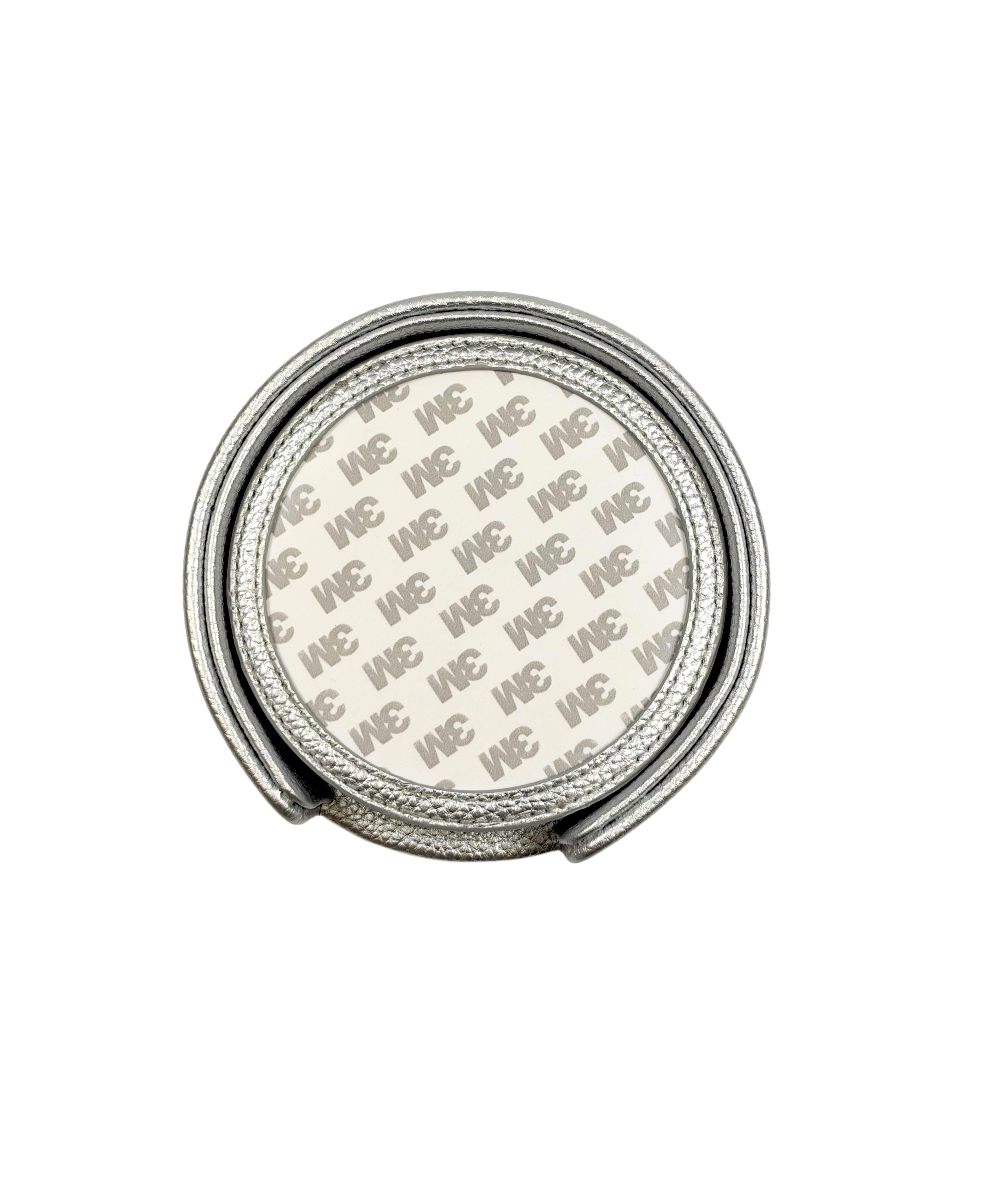 Stacked metallic silver self-finishing needlepoint coasters featuring round frames designed for personalized needlepoint canvases.