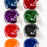 Assorted color football helmet claw clips arranged as a grid on a white background. 
